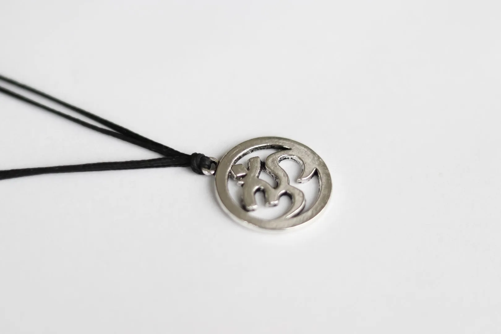 Men's necklace with a silver Om pendant, black cord, yoga jewelry for man handmade, gift wrapped